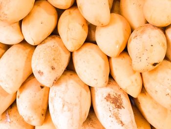 Full frame shot of onions for sale at market stall