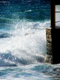 Waves splashing on rocks