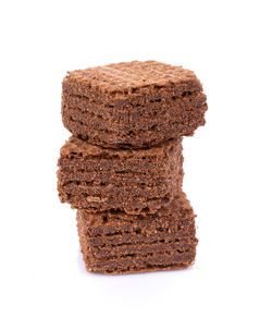 Close-up of chocolate cake against white background