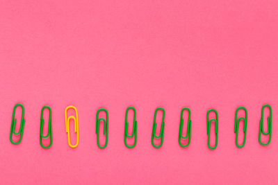 Close-up of text on pink background