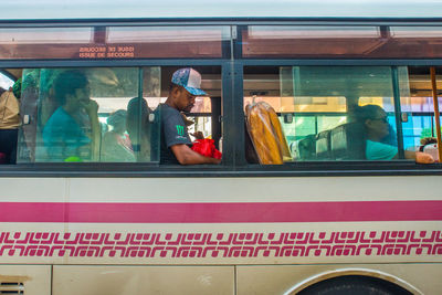 Reflection of people on glass window