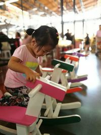 Cute girls playing with toy