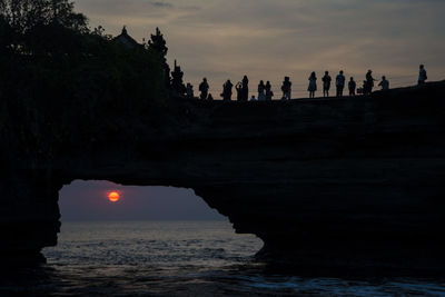 Silhouette of historical building at sunset