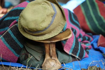 Close-up of hat on textile