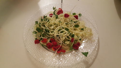 High angle view of fruit salad in plate on table