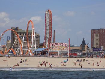 View of amusement park ride against sky