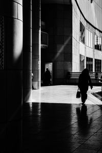 Full length of man walking in building