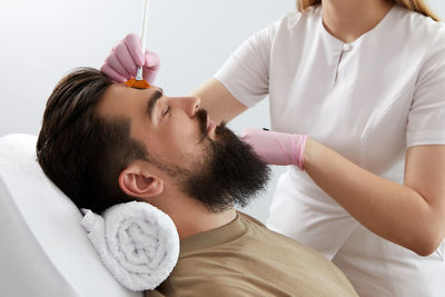 Female doctor examining patient