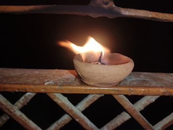 Close-up of burning candles