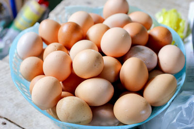 High angle view of eggs in market for sale
