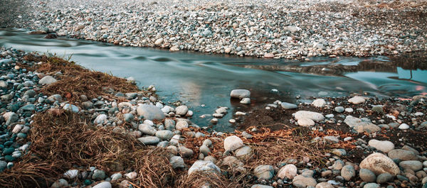 High angle view of stones at beach