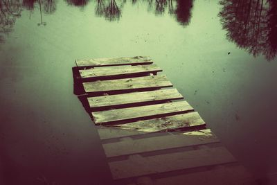 High angle view of empty seats in lake