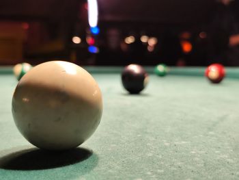 Close-up of pool balls on table