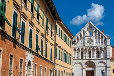 Low angle view of building against blue sky