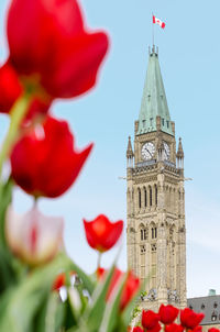 Low angle view of clock tower against sky