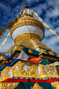 Low angle view of temple against building