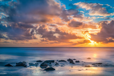 Scenic view of seascape at sunrise