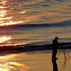 Scenic view of sea at sunset