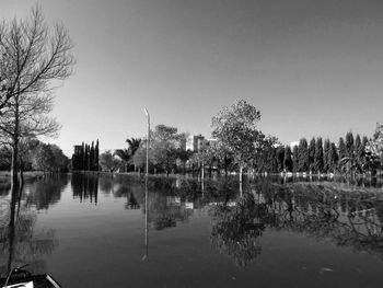 Reflection of buildings in calm water