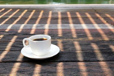 Close-up of coffee cup on table