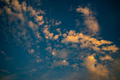 Low angle view of clouds in sky during sunset