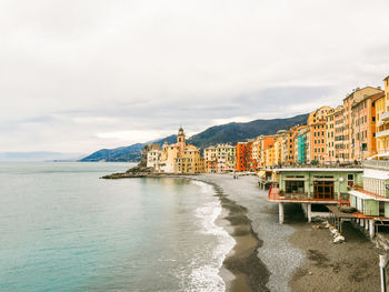 Buildings by river