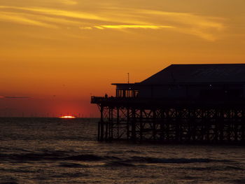 Scenic view of sea at sunset