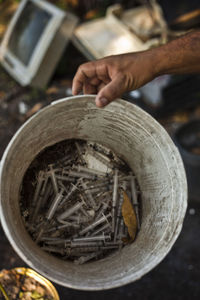 Close-up of man working on metal