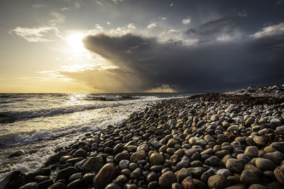 Scenic view of sea against sky during sunset
