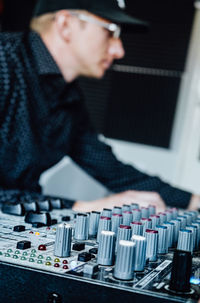 Man playing piano on table