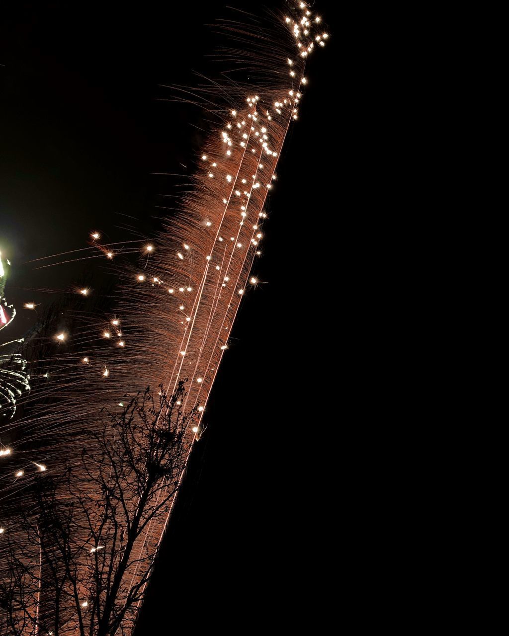 LOW ANGLE VIEW OF ILLUMINATED STREET LIGHT AT NIGHT