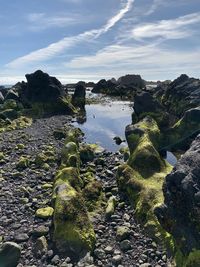 Scenic view of rocks against sky