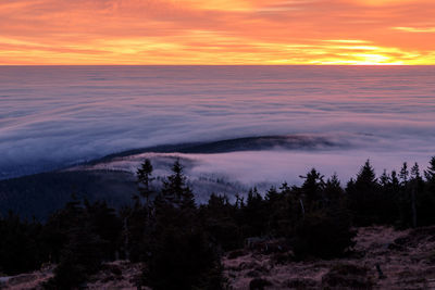 Scenic view of sea against sky during sunset. brocken harzmountains