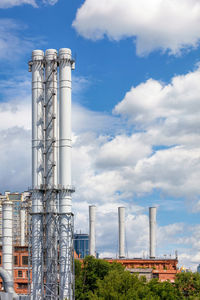 Clean air and clear sky above the pipes of the factory after it stopped.