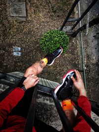 High angle view of man holding umbrella