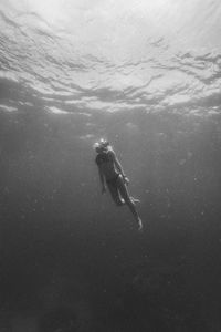 Person swimming in sea