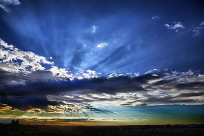 Landscape against cloudy sky