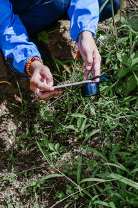 High angle view of farmer gardening