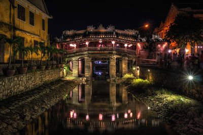 Japanese covered bridge lit up taken at night. also called cau temple. hoi an ancient town, vietnam.