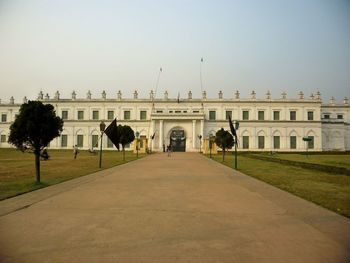 Facade of historic building against clear sky