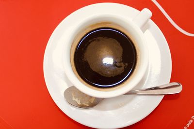 Directly above shot of coffee cup on table