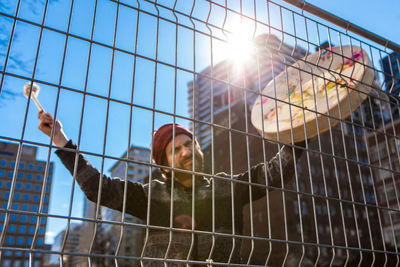 Low angle view of man against sky