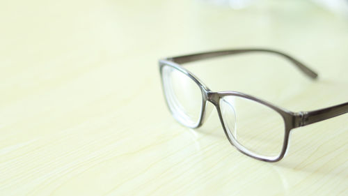 Close-up of eyeglasses on table