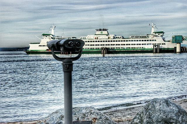 water, sea, sky, built structure, building exterior, architecture, cloud - sky, nautical vessel, cloud, rippled, transportation, day, lighthouse, cloudy, nature, mode of transport, outdoors, pier, no people, horizon over water