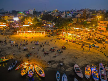 High angle view of illuminated buildings in city at night