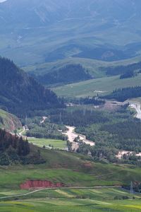 High angle view of field against mountains