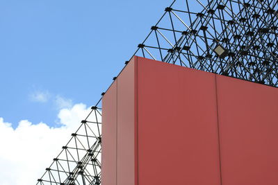 Low angle view of telephone pole against sky