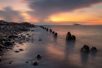 Scenic view of sea against sky during sunset