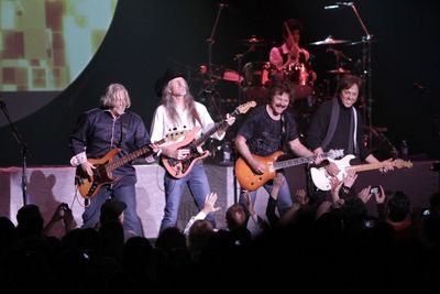 Group of people playing guitar