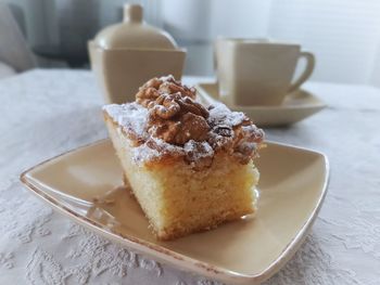 Close-up of cake served in plate on table